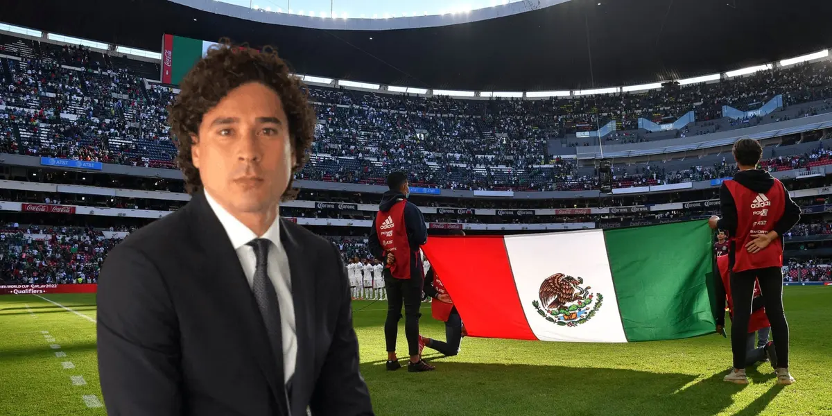 Guillermo Ochoa de traje y bandera de México/ Foto Selección Nacional.